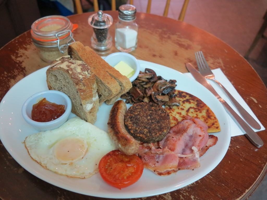 Scottish Breakfast, including haggis, sausage, egg, and toast